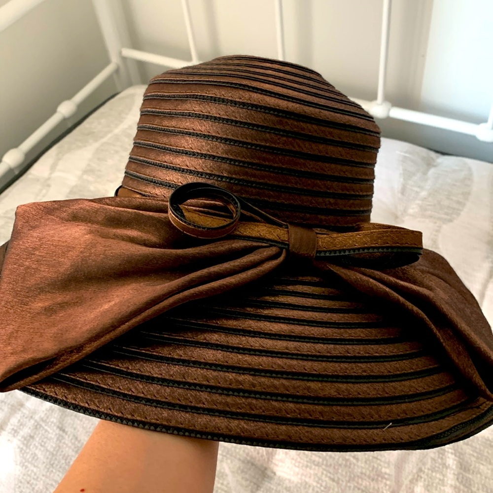 Wide-brim Giovannio hat with beautiful satin bow.
